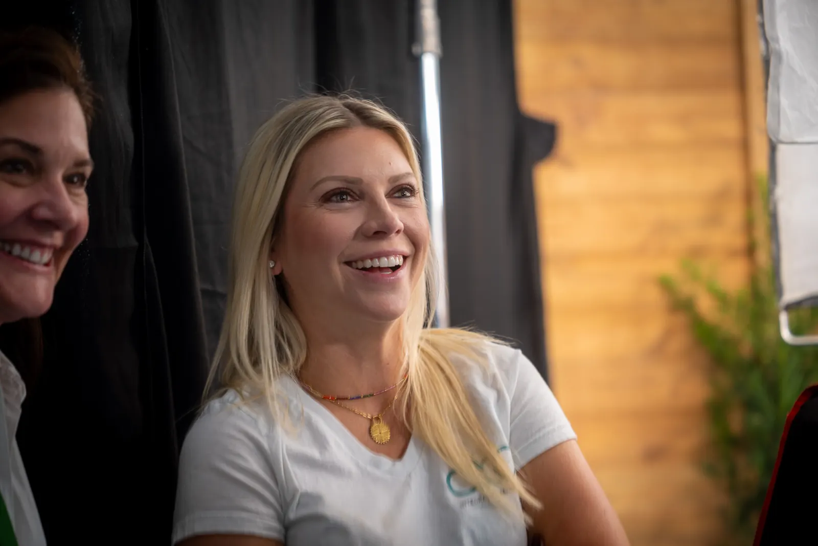 Agency and Client laughing at footage having a good time on set.