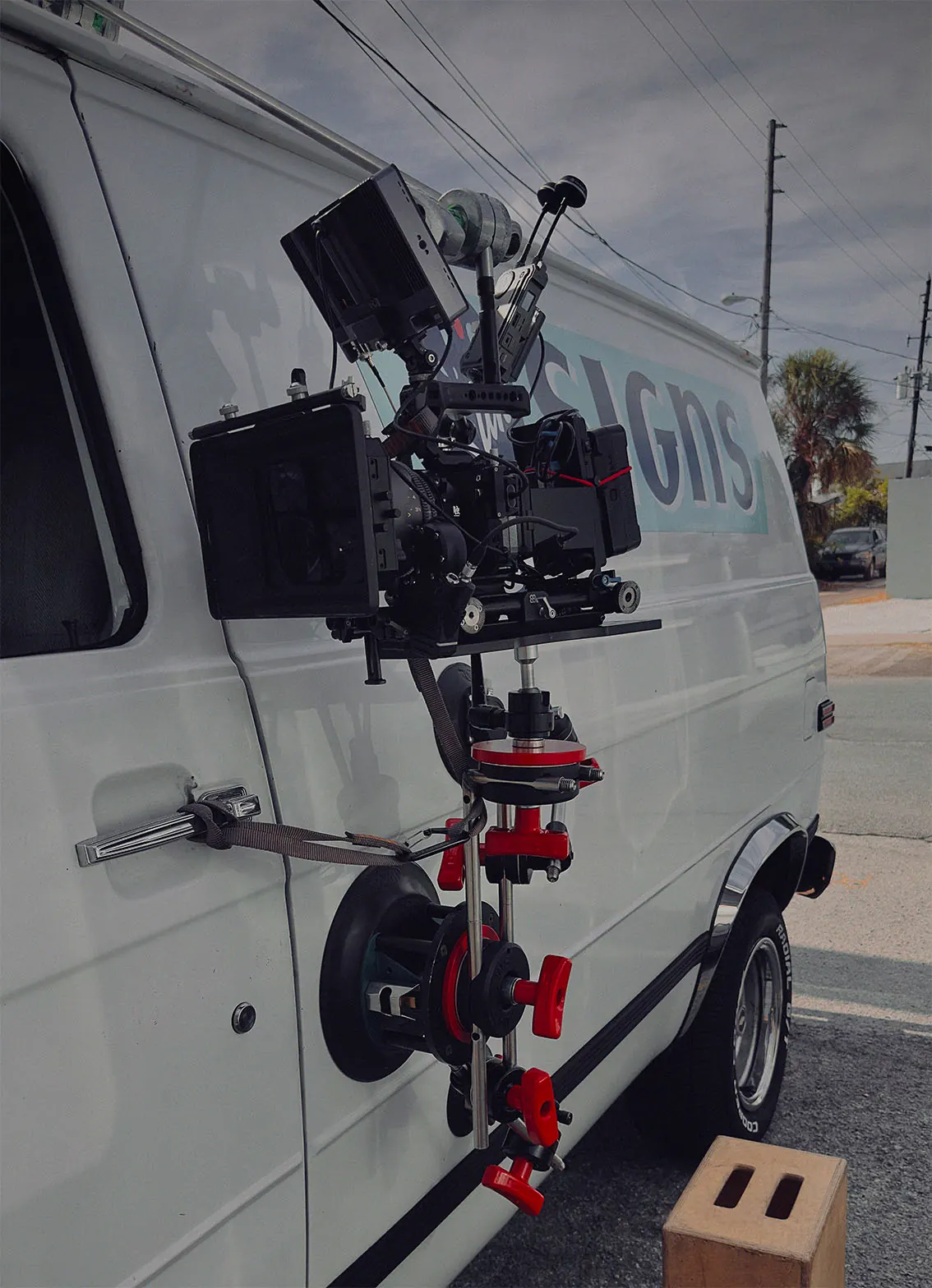 Behind-the-scenes of car rig for hand-painted signage brand video in St. Pete, FL