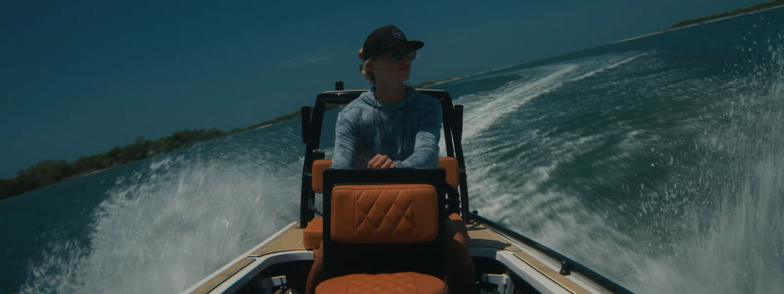 Erica driving her skiff