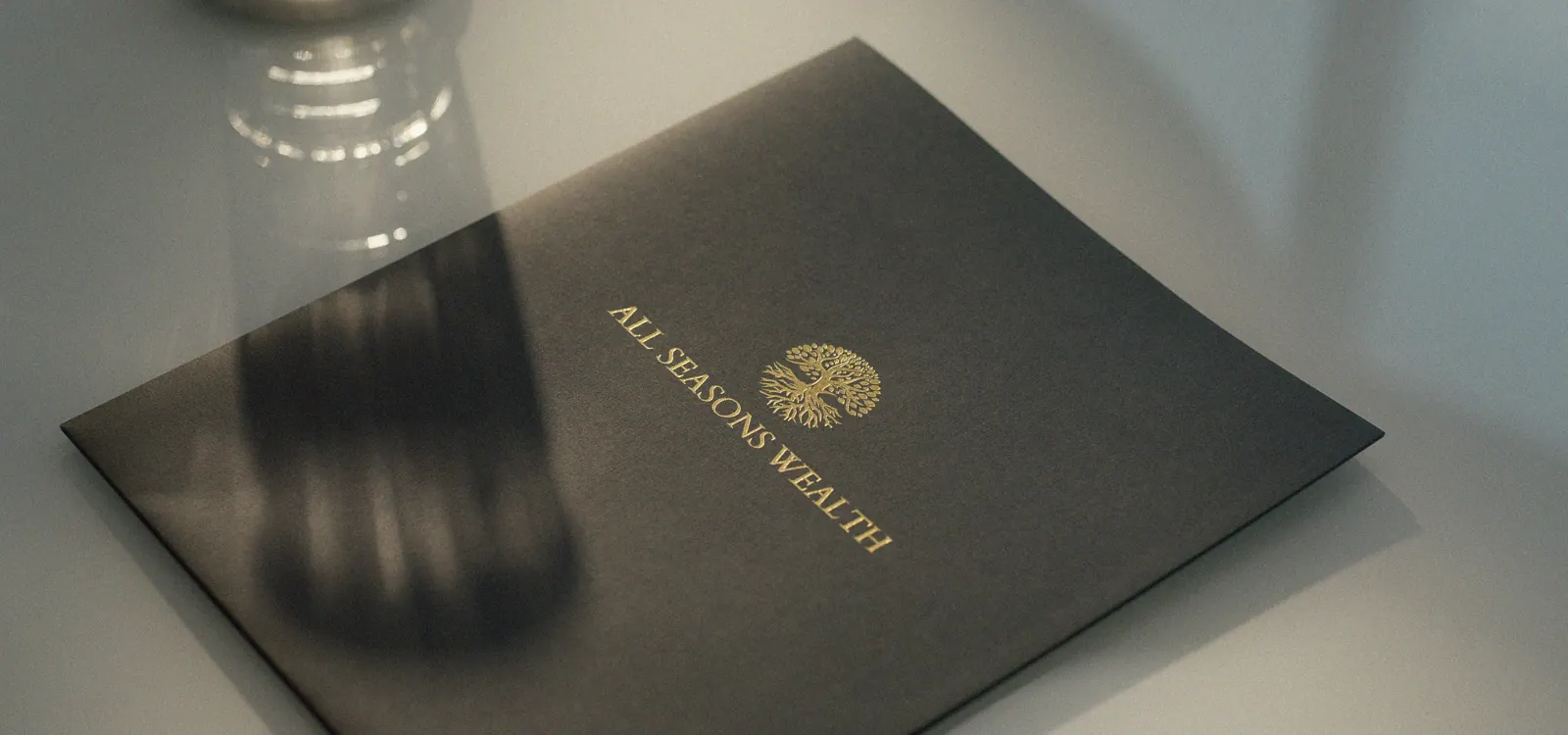 Folder with glass refracting light
