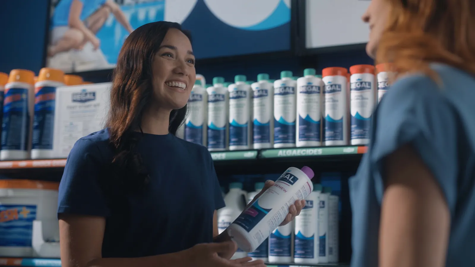 Still from recent video projects: Woman showing product